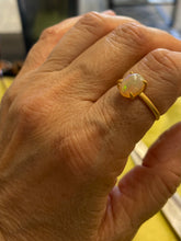 Ring with Ethiopian opal with prongs