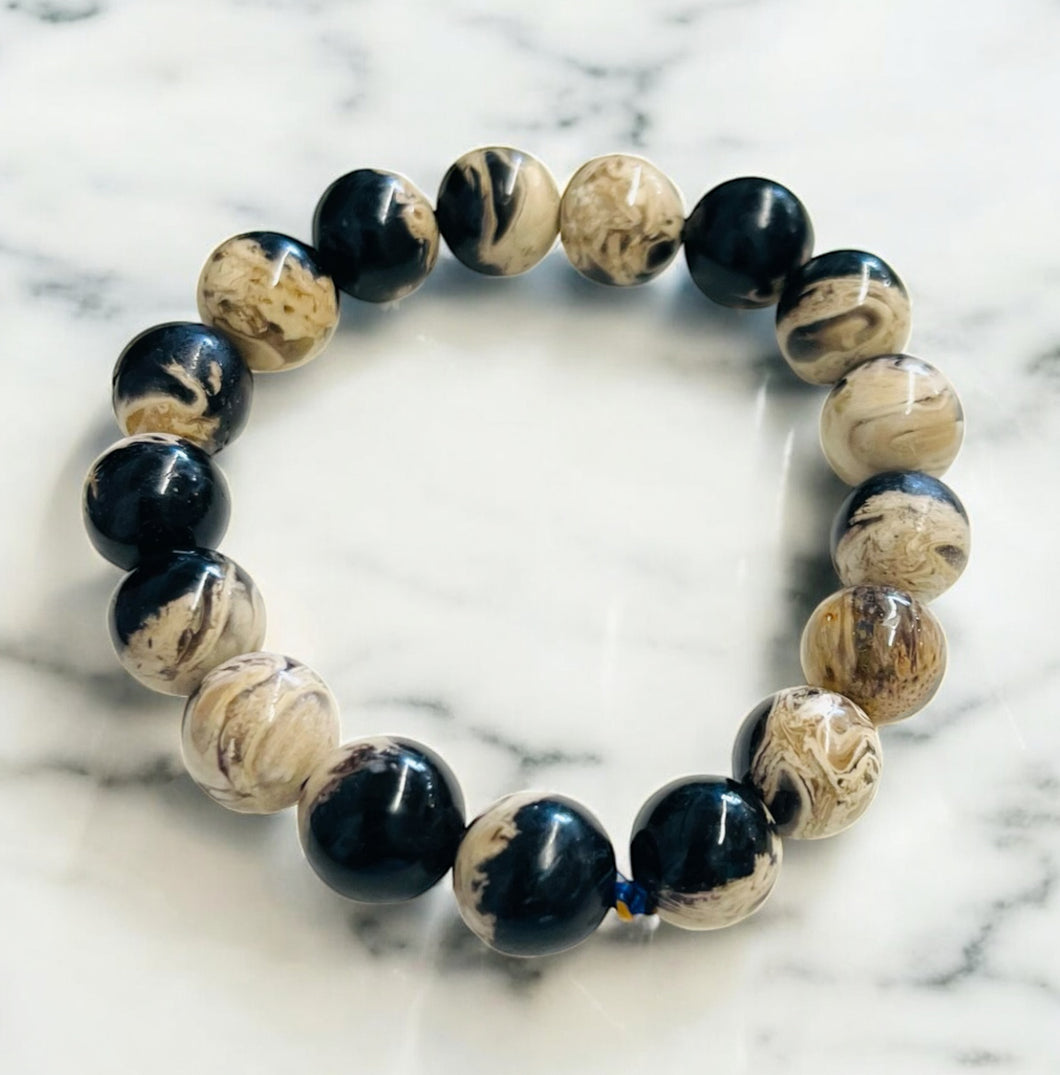 Bracelet with petrified palm root