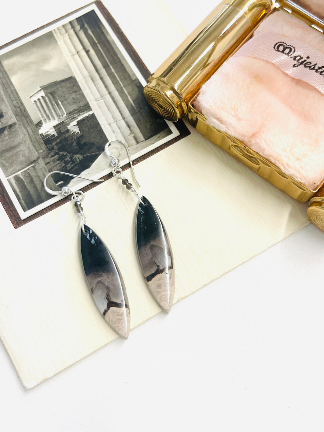 Earrings with dark pine root