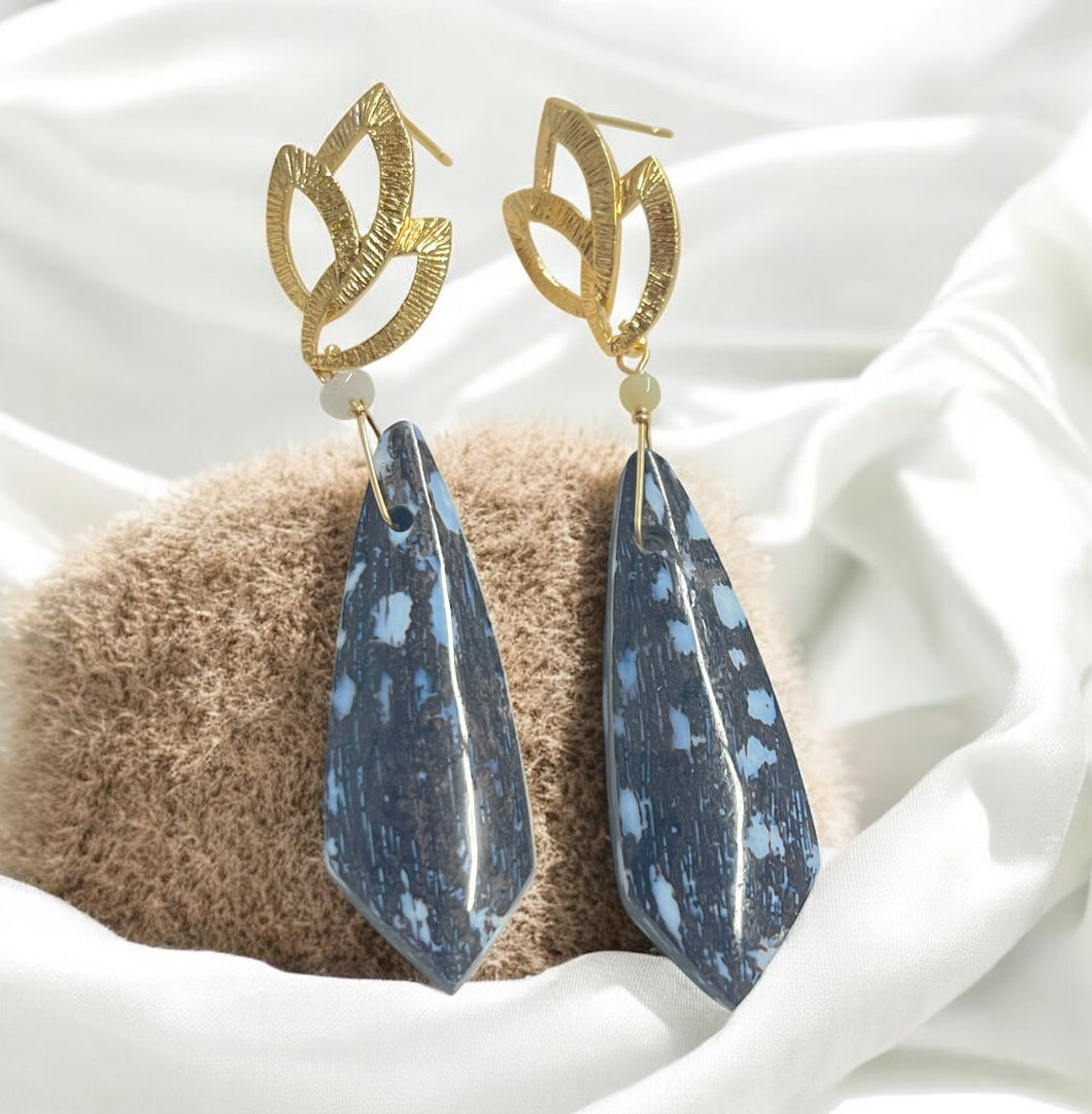 Earrings with petrified palm root