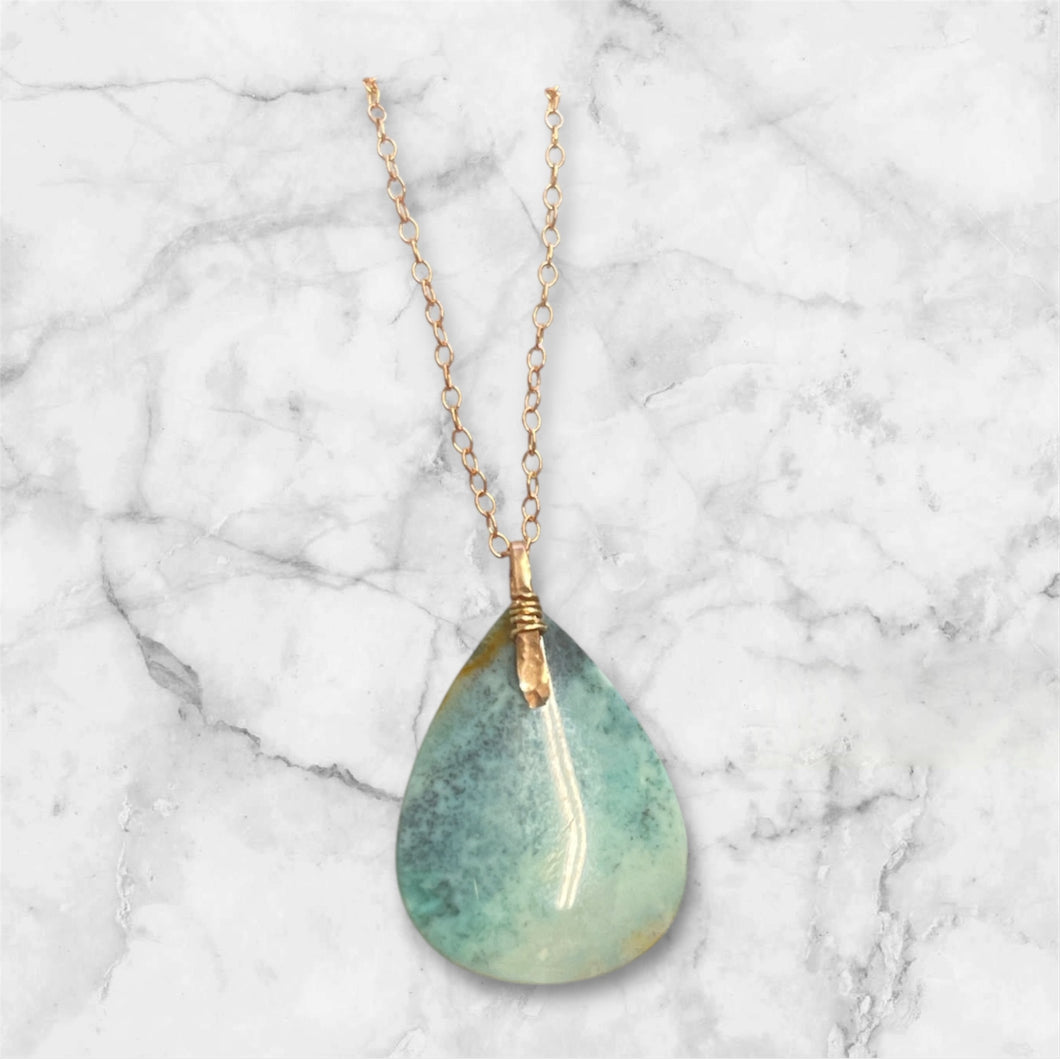 Pendant with blue petrified wood