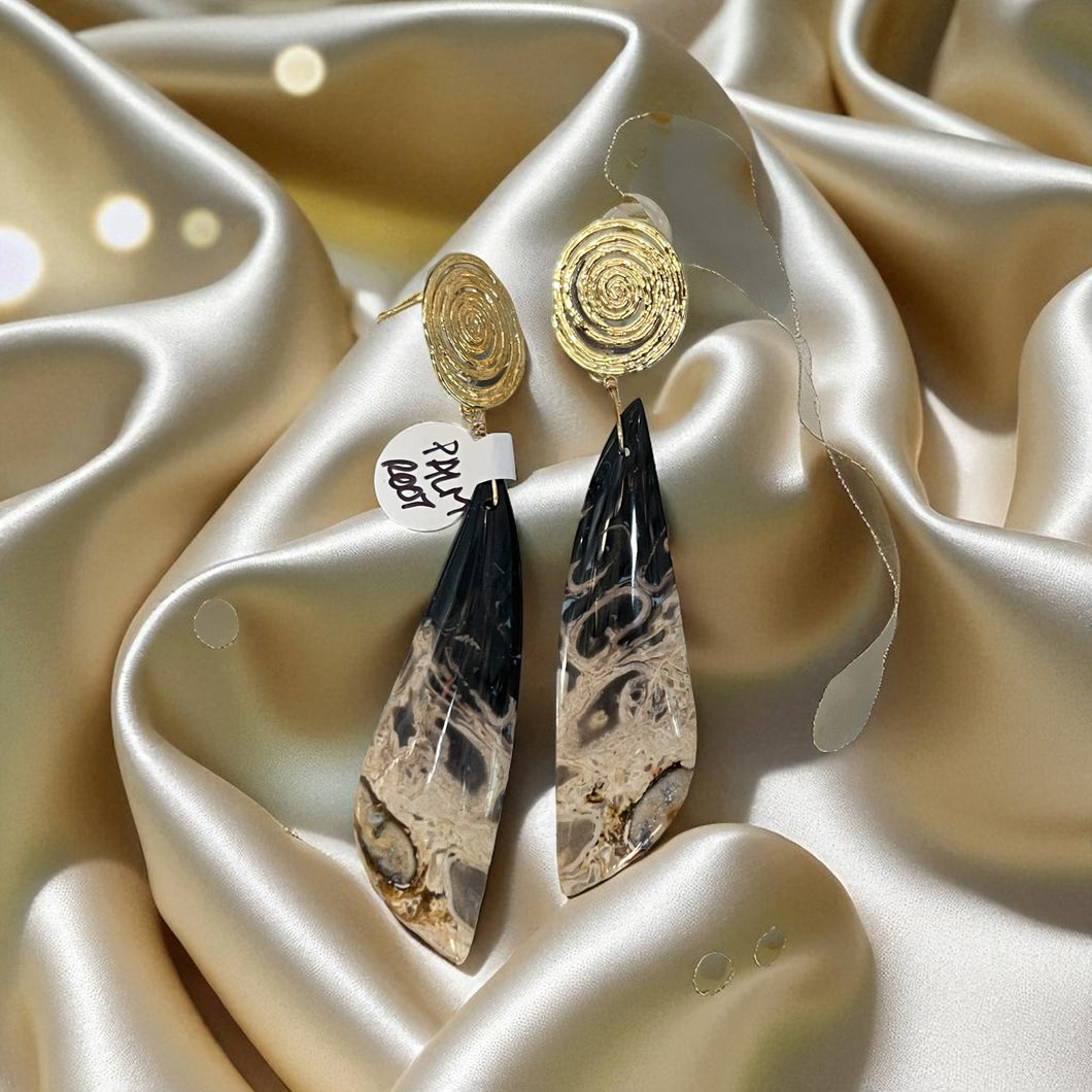Earrings with petrified palm root