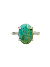 Ring with oval green opalized wood