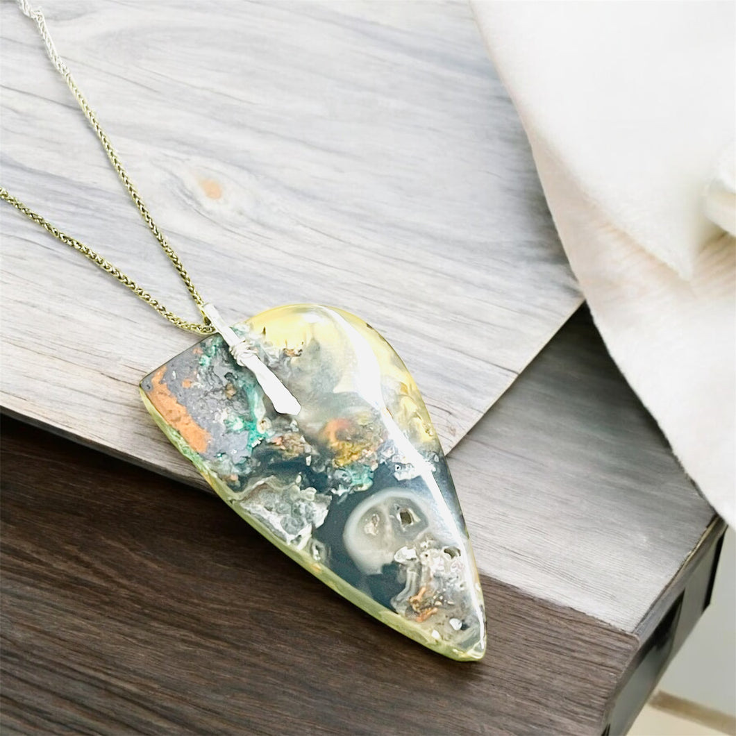 Pendant with dark chrysocolla black color