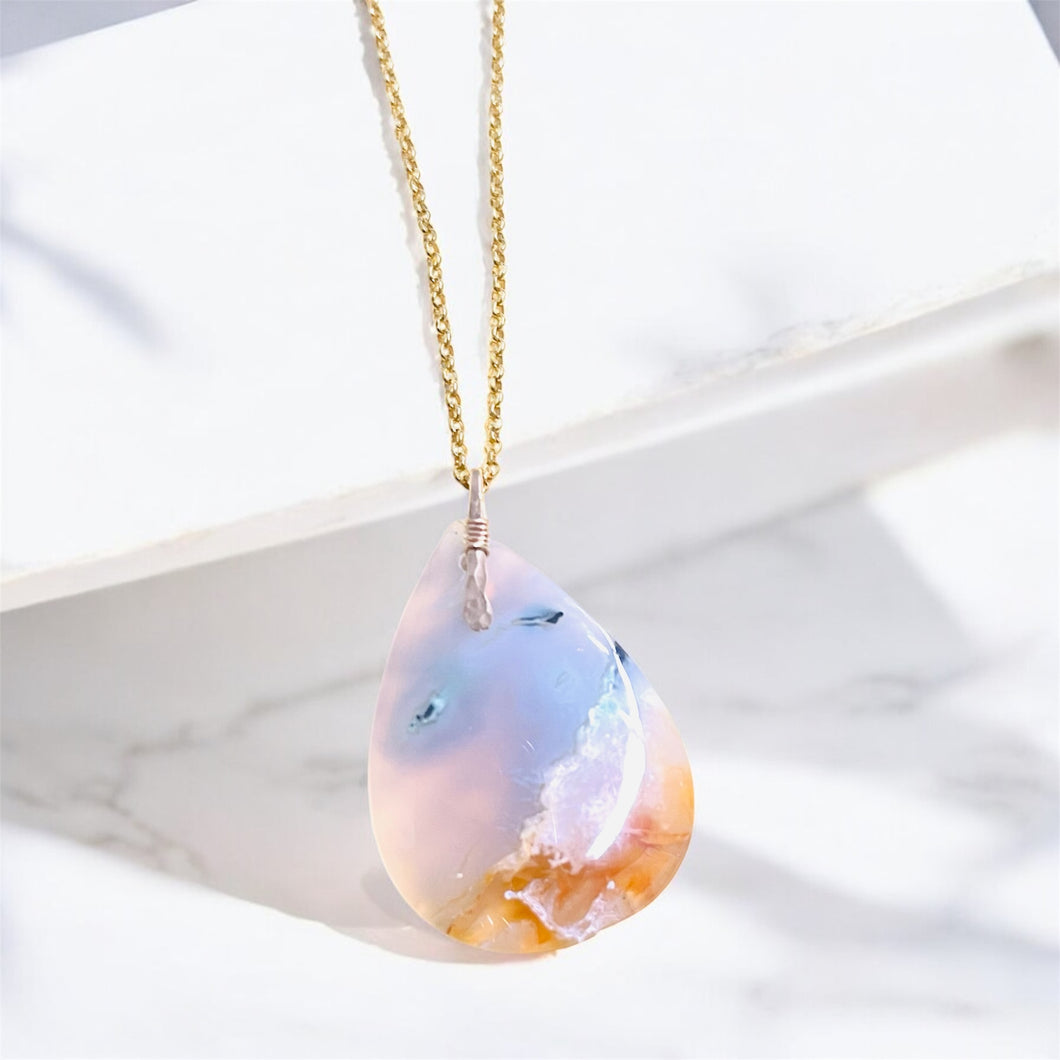 Pendant  with light colors petrified opalized wood