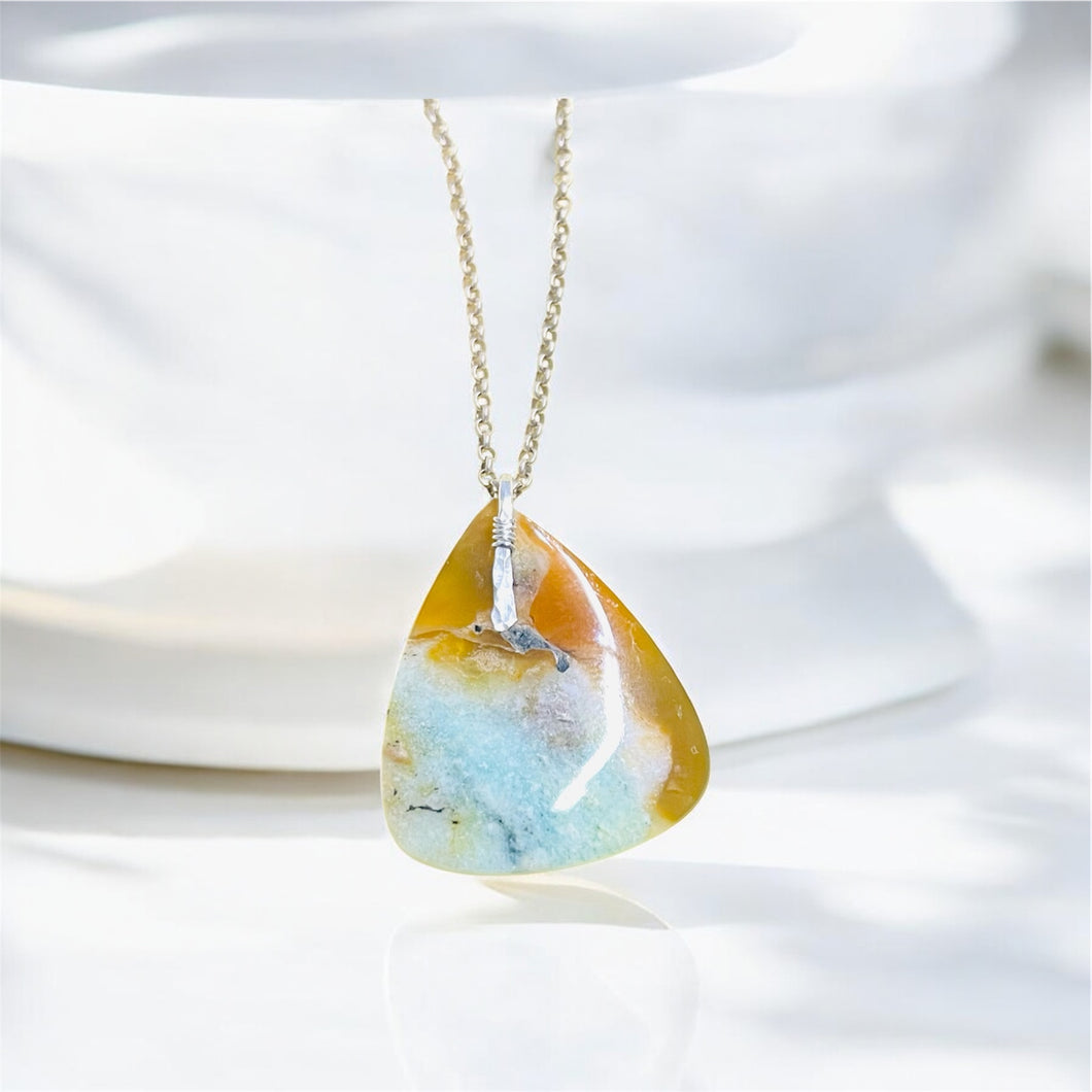 Pendant  with light colors petrified opalized wood