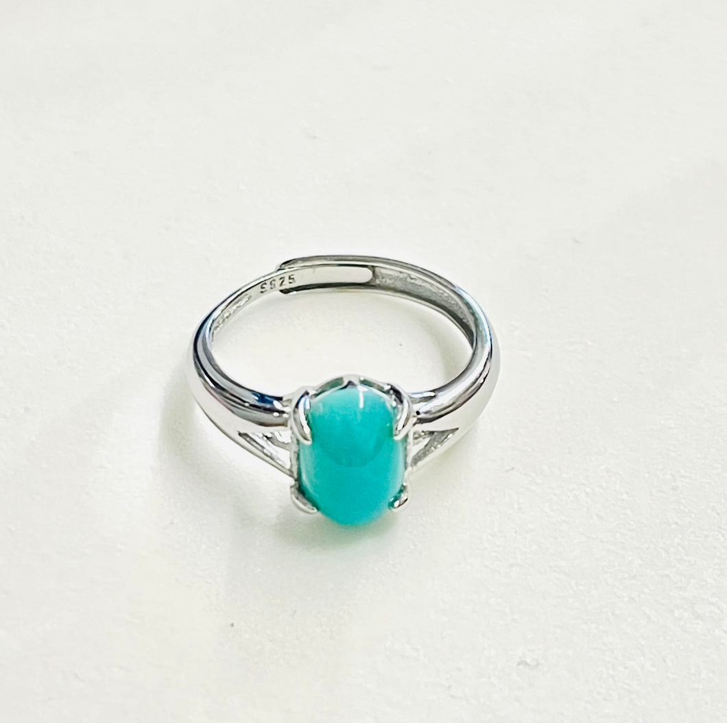 Ring with small bright gem Silica wood