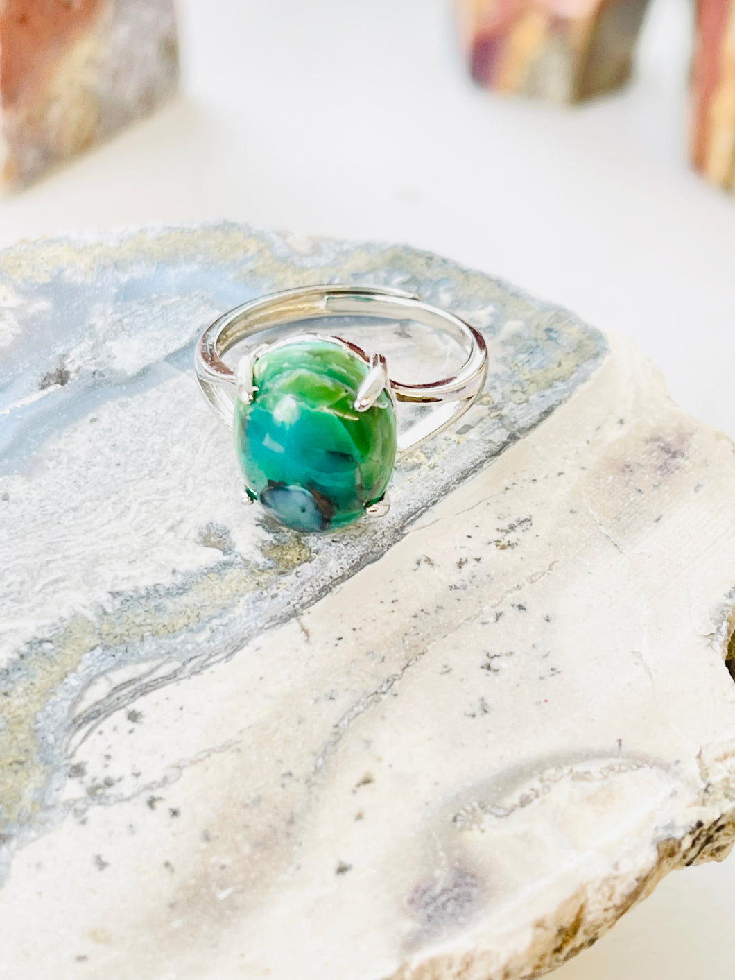 Ring with sea green color in Opalized wood