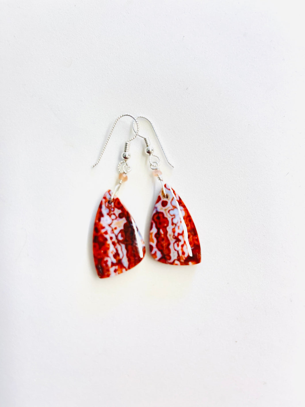 Earrings with plume agate