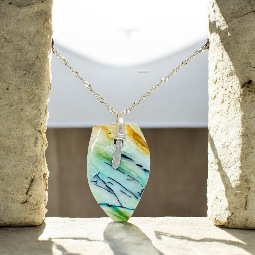 Pendant with natural petrified opalized wood