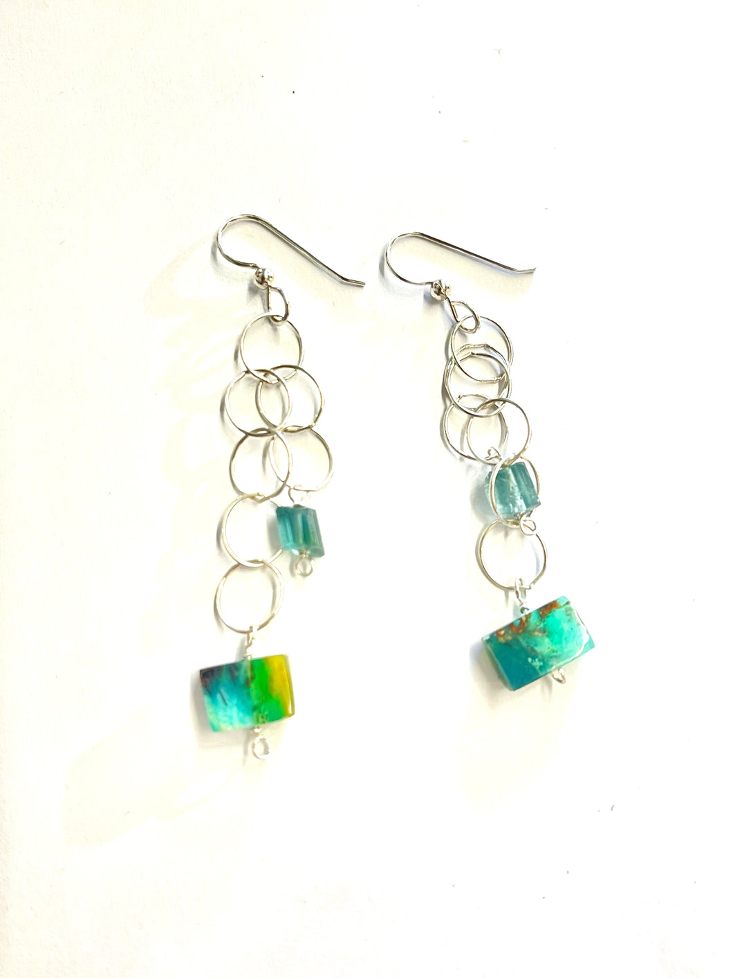 Earrings with chain and unique cut opalized wood and indigo tourmaline