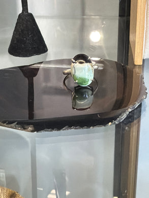 Ring with green petrified opalized wood