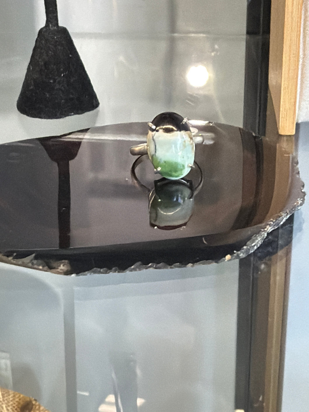 Ring with green petrified opalized wood