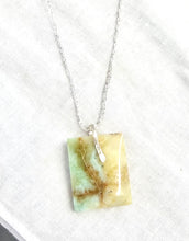 Pendant with natural petrified opalized wood
