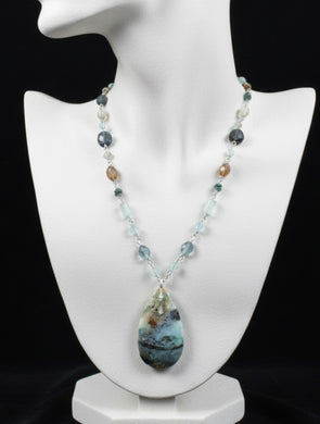 Necklace with opalized wood and various stones