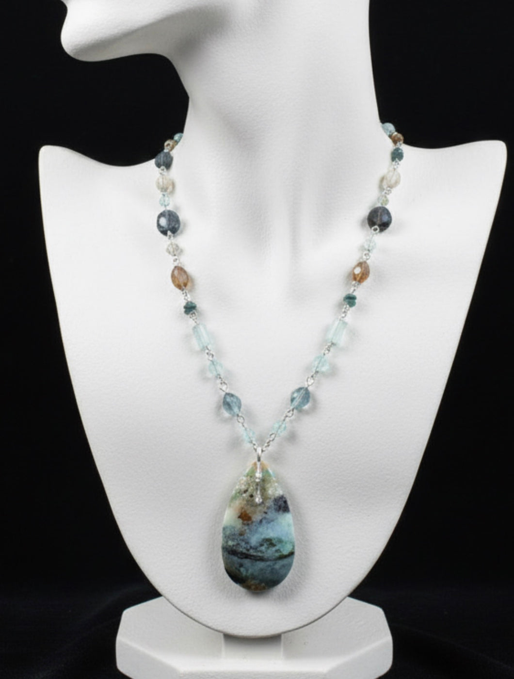 Necklace with opalized wood and various stones
