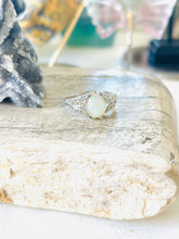 Ring with white Ethiopian opal