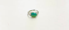 Ring with beautiful green petrified opalized wood