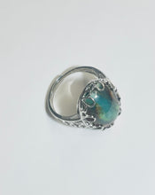 Ring with opalized petrified wood cabochon