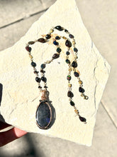 Necklace with black Kalimaya matrix opal