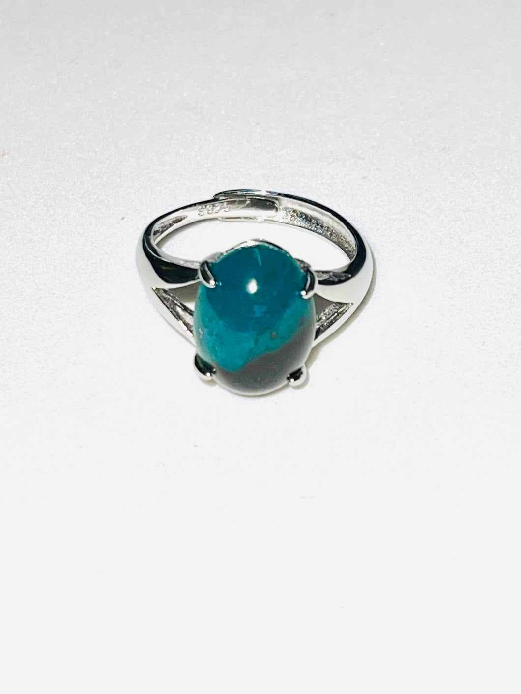 Ring with dark opalized wood