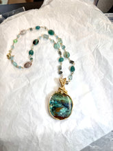 Necklace with opalized wood and various stones