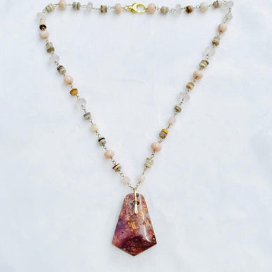 Necklace with pink druzy fossil