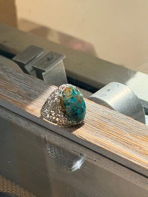 Ring with opalized petrified wood cabochon
