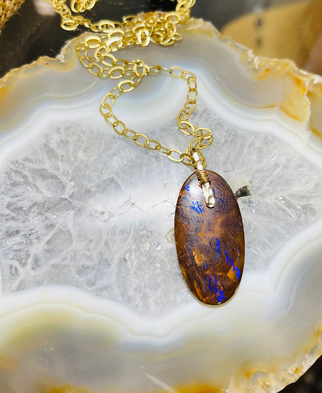 Pendant with koroit opal with purple and brown shades