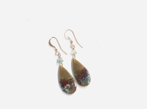 Earring with dark opalized wood