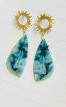 Earrings with light blue opalized wood