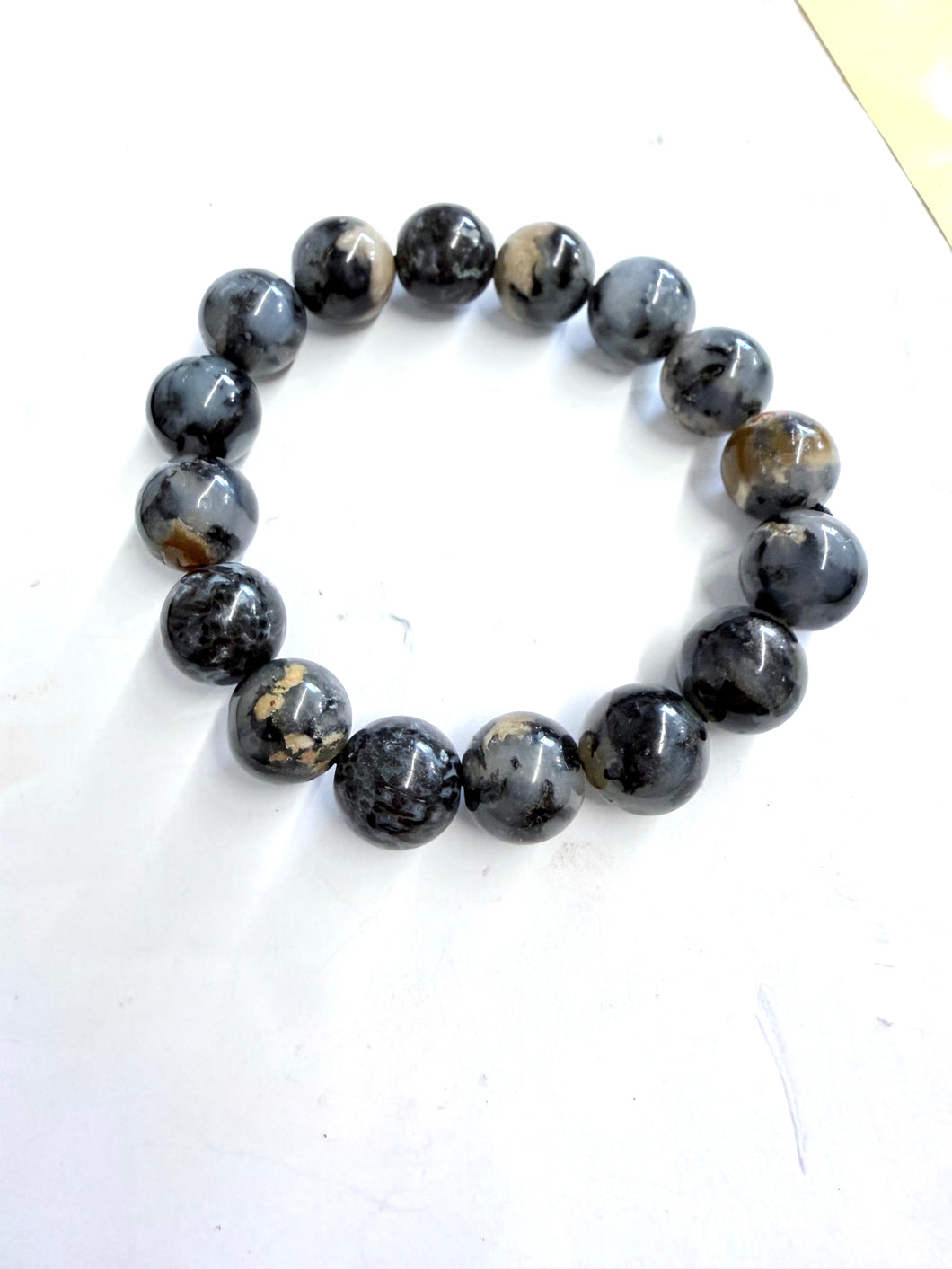 Bracelet with petrified pine root