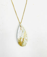 Pendant with white petrified wood from Java