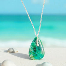 Pendant with petrified opalized wood