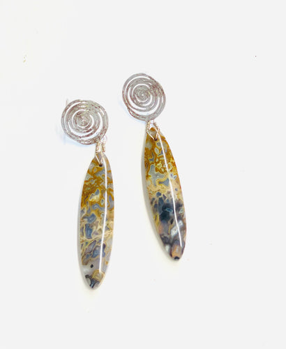 Earrings with petrified palm root