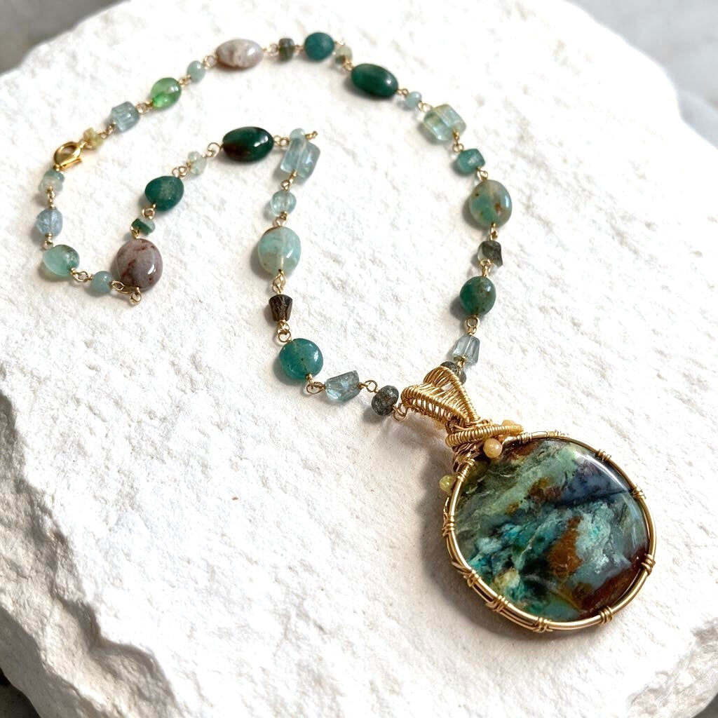 Necklace with opalized wood and various stones