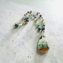 Necklace with opalized wood and various stones