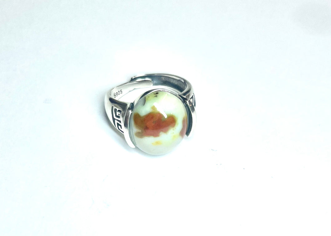 Ring with opalized wood cabochon