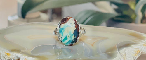 Ring with green brown opalized wood