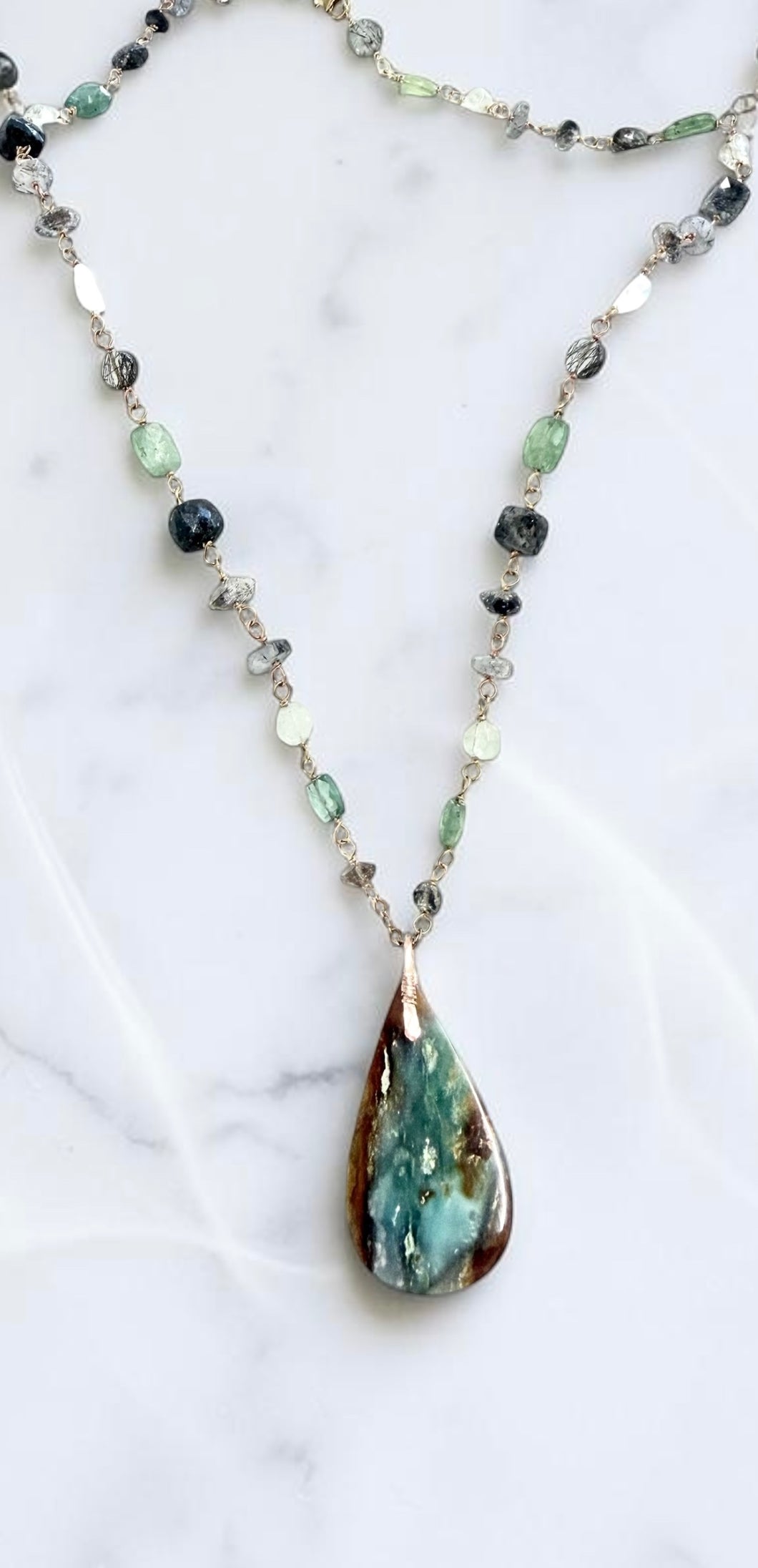 Necklace in green colors of Opal wood