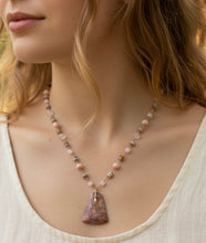 Necklace with pink druzy fossil
