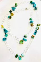 Necklace with chain and opalized wood