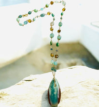 Necklace with long Opalized wood and gem stones