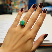 Ring with baby blue petrified opalized wood