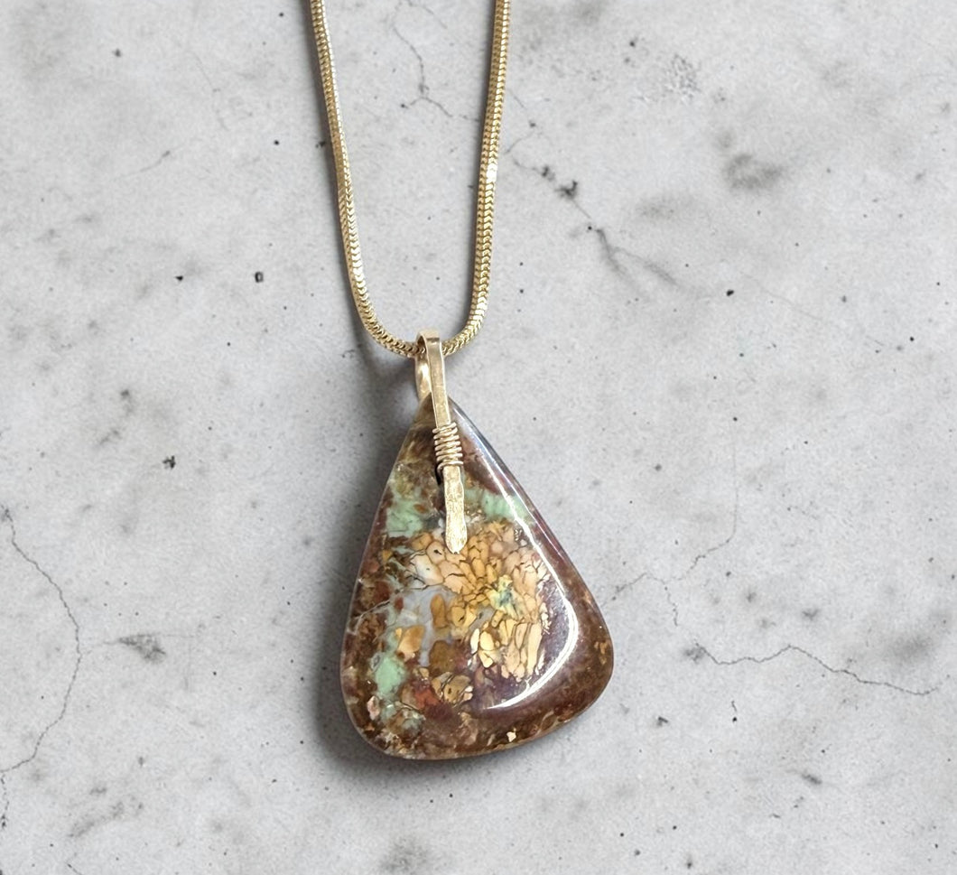 Pendant with natural petrified opalized wood
