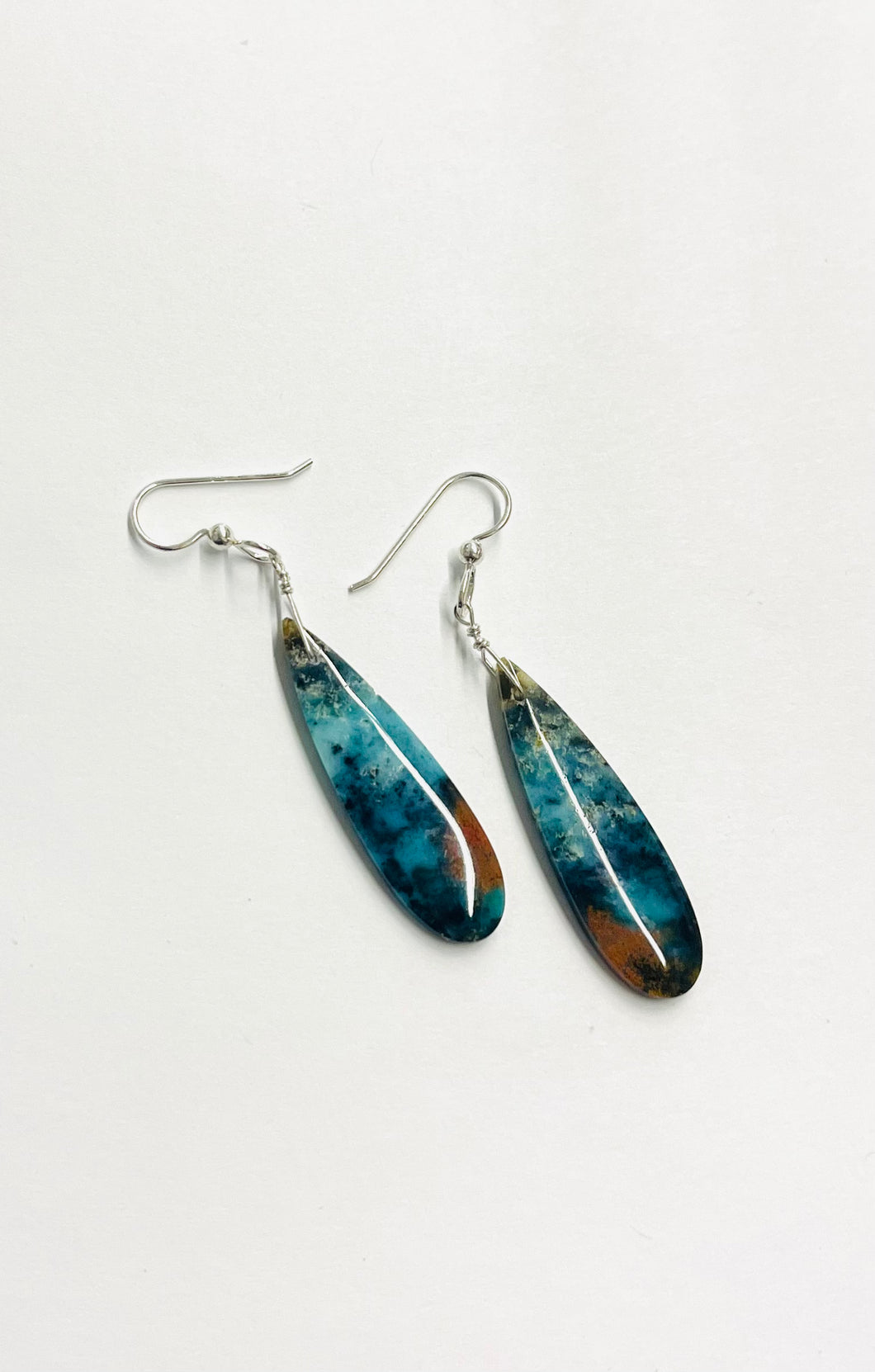 Earrings with dark color opalized wood