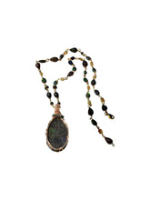 Necklace with black Kalimaya matrix opal