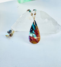 Necklace with dark opalized petrified wood