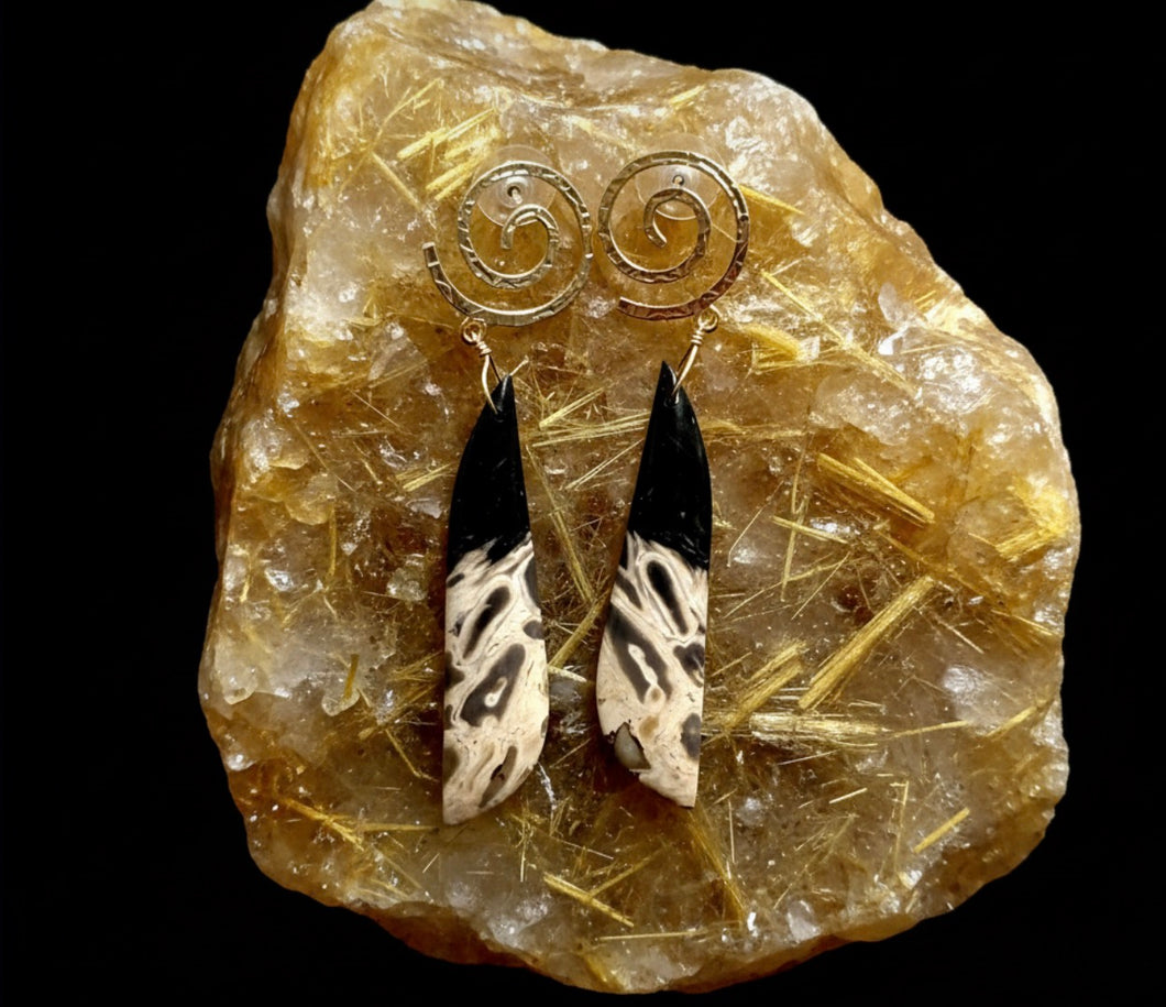 Earrings with petrified palm root