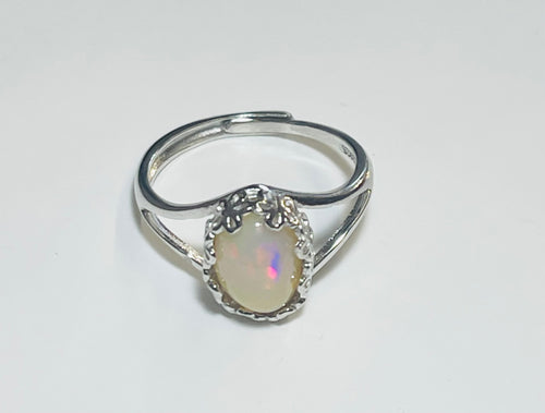 Ring with white opal matrix